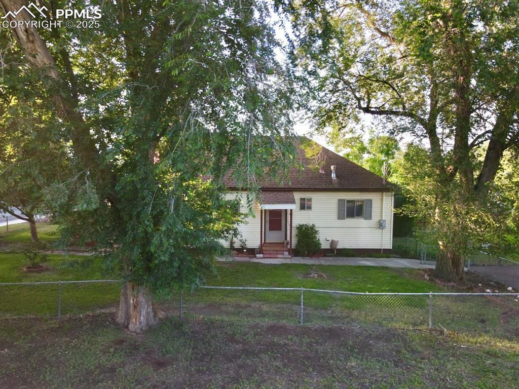 Image 19 of 24: View of front of house