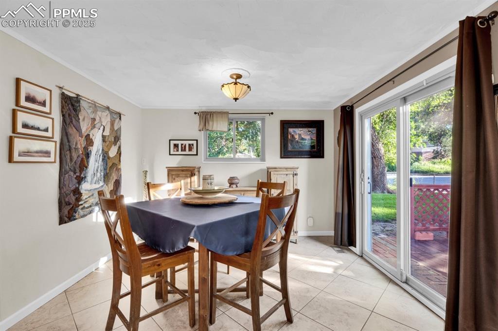 Image 6 of 24: Dining Area with Walkout to Deck