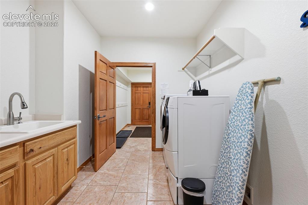 Image 37 of 50: 1 of 2 laundry rooms