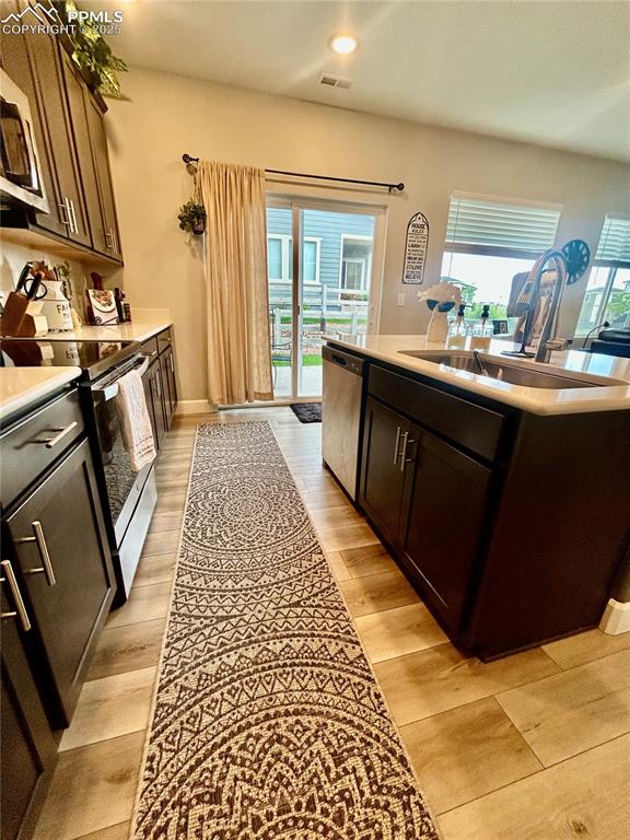 Image 12 of 30: Another view of the kitchen.