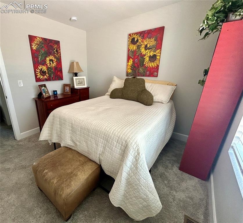 Image 18 of 30: Second bedroom.