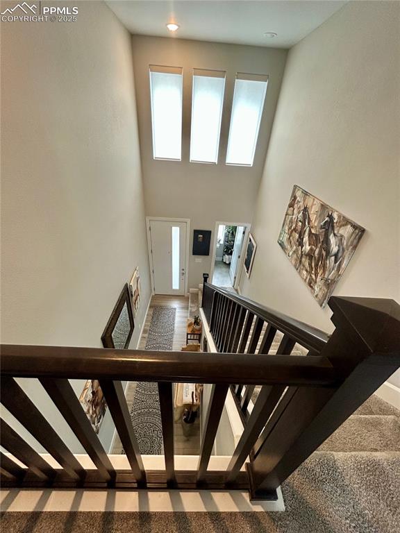 Image 21 of 30: Looking from the loft to the entry front door.