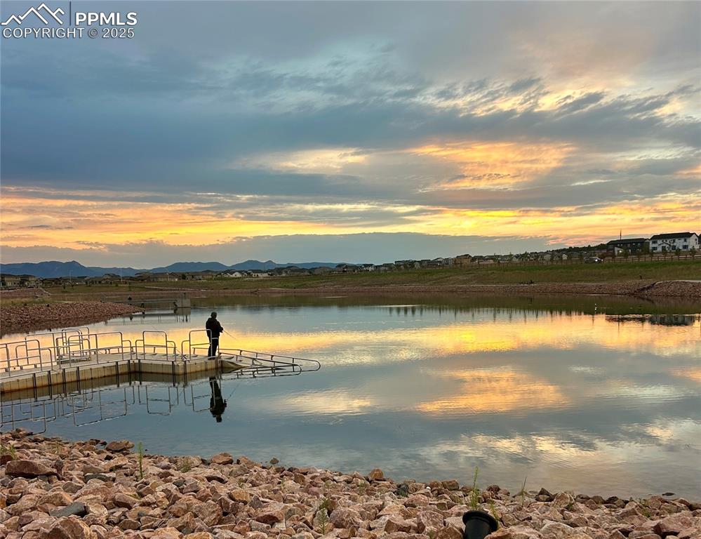Image 28 of 30: Sunsets are magical at Wolf Lake.