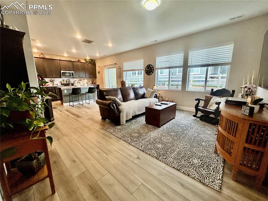 Image 5 of 30: Looking into the living room from the foyer.