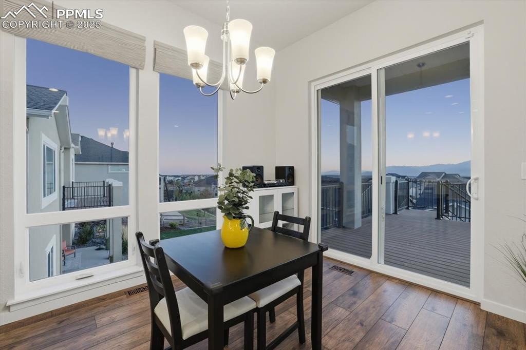 Image 13 of 43: Dining space with spectacular mountain views