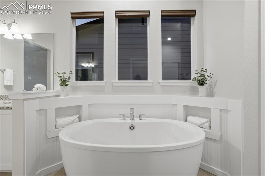 Image 17 of 43: Full bathroom featuring a freestanding tub