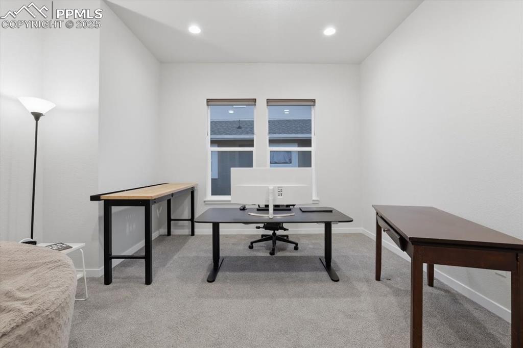 Image 26 of 43: Office featuring light carpet and recessed lighting