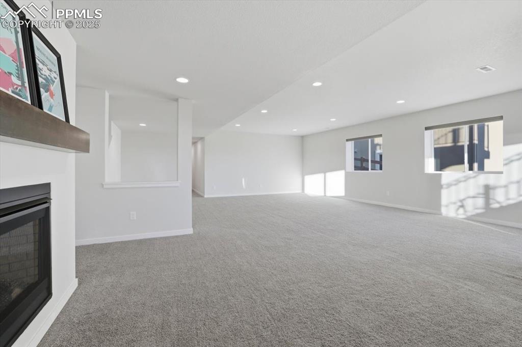 Image 33 of 43: Walk out access to covered patiio