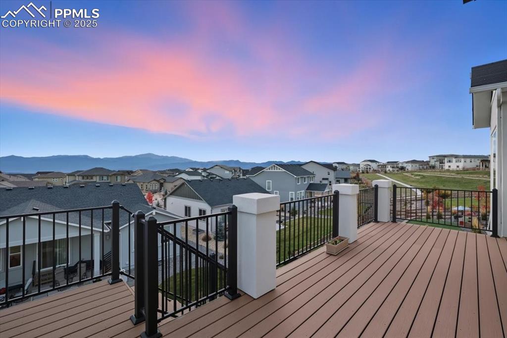 Image 4 of 43: Low maintenance deck featuring a residential view