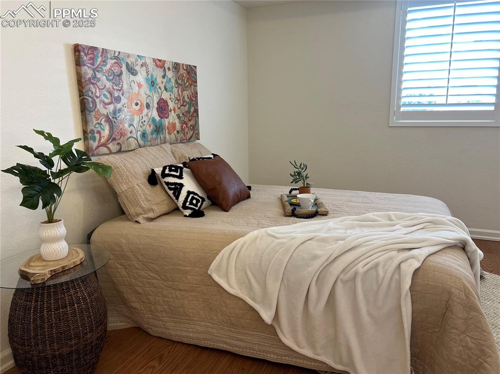 Image 13 of 30: Staged with a queen size, king size and 2 side tables would fit nicely.