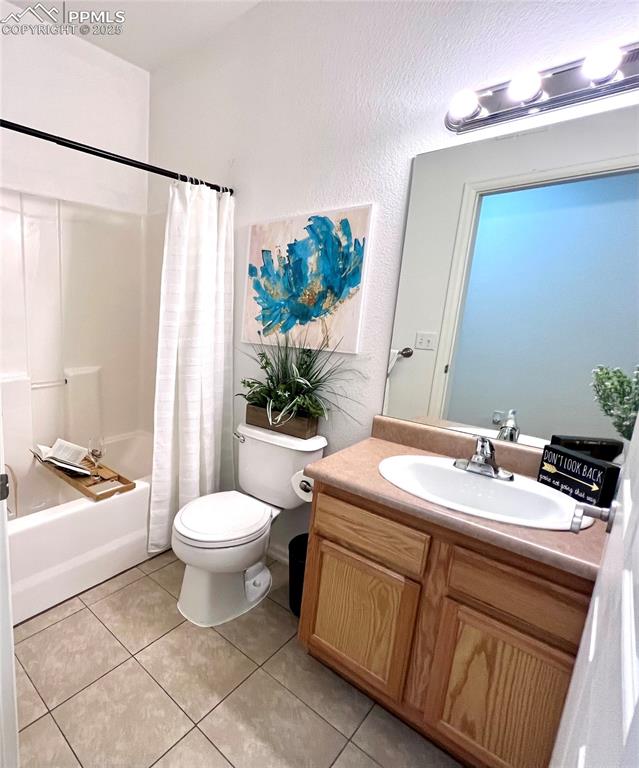 Image 22 of 30:  tile flooring in bathroom 2-next to bedroom 2