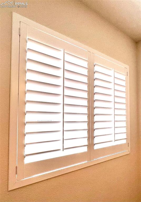 Image 23 of 30: shutters provide great light and sound control