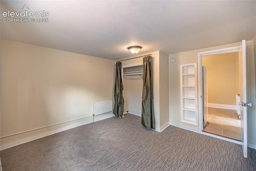 Image 14 of 27: Bedroom