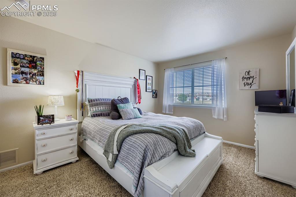 Image 16 of 28: Bedroom