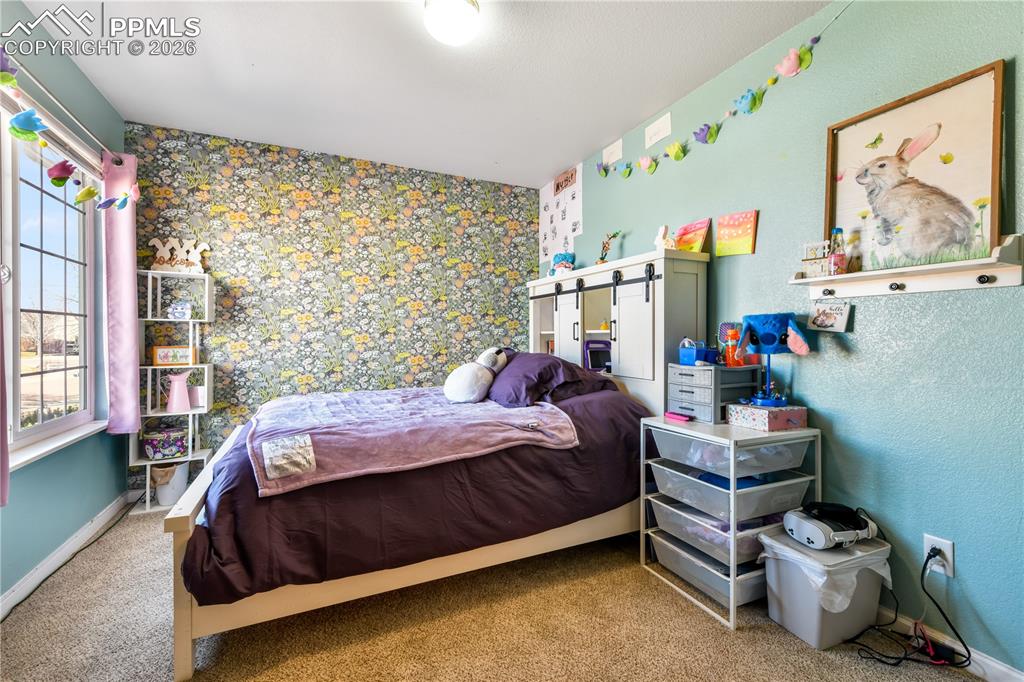 Image 23 of 50: Bedroom