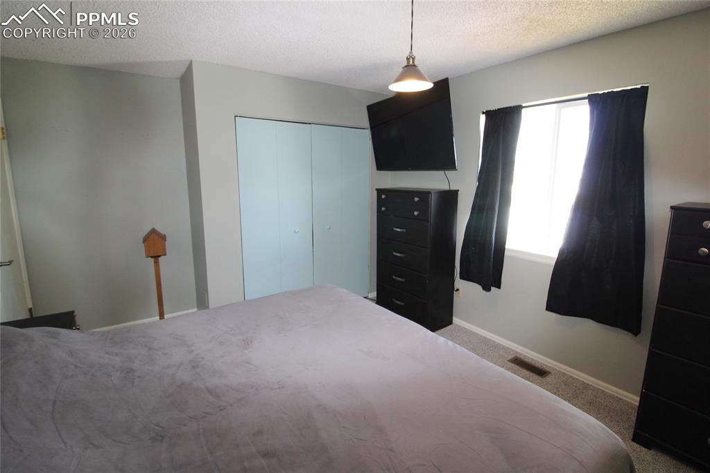 Image 12 of 27: Bedroom