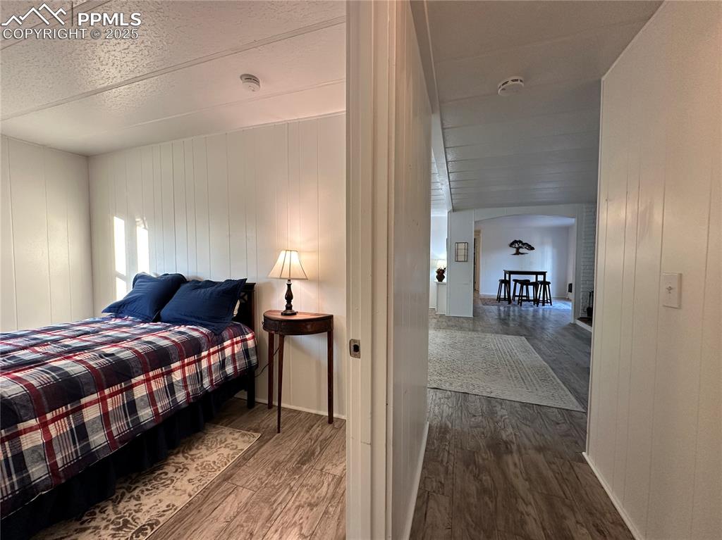 Image 22 of 36: Bedroom located outside of the living room.