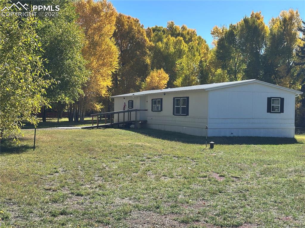 Image 34 of 36: West side with view of the well head.