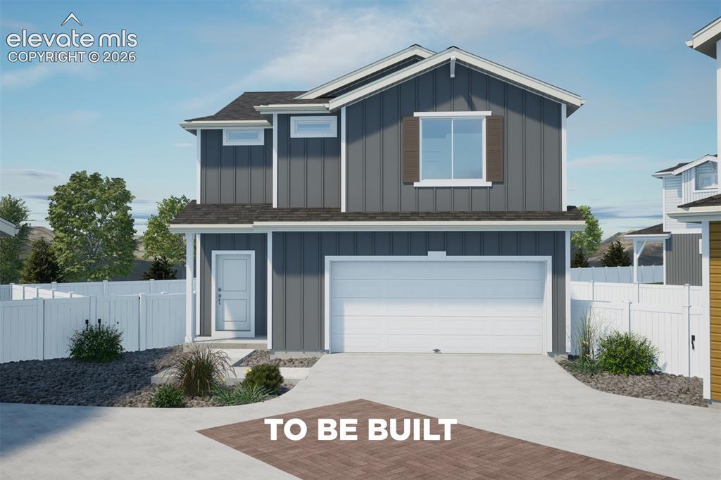 Caption: Contemporary exterior featuring vertical siding, attached garage, covered entry, and white privacy f