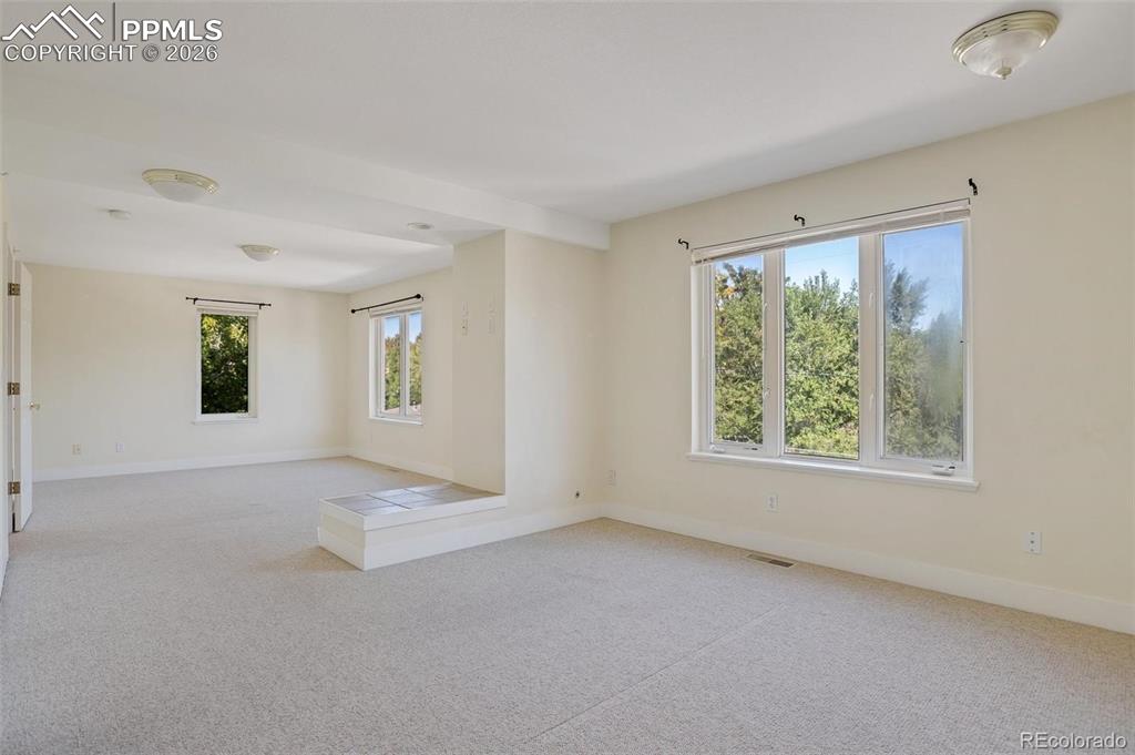 Image 20 of 27: Giant Windows bathe The Primary in Sunshine