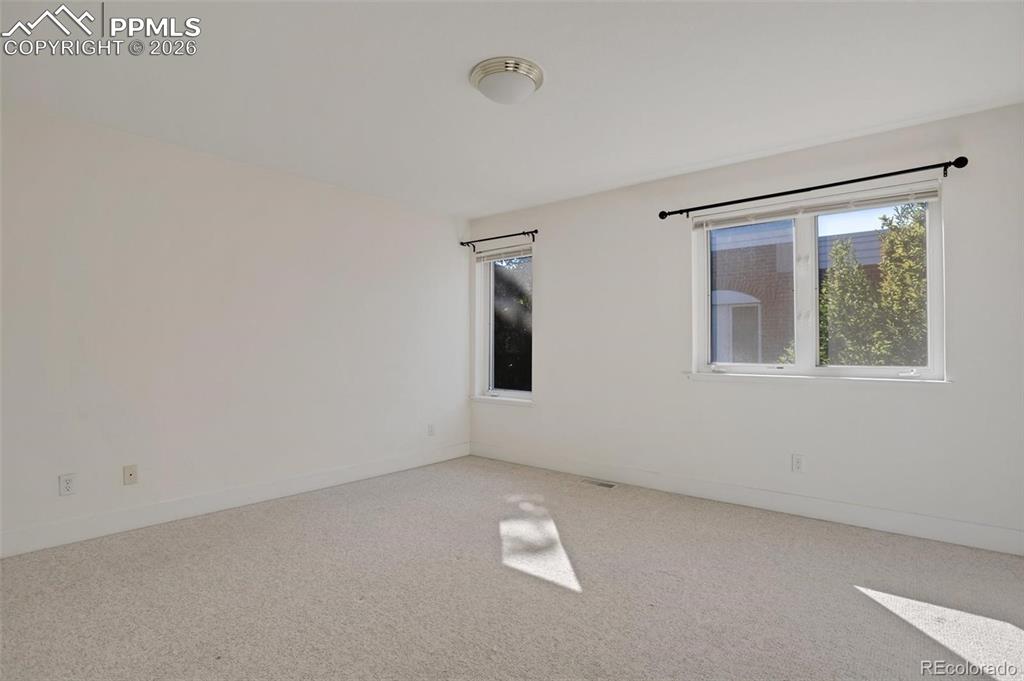 Image 21 of 27: Second Bedroom