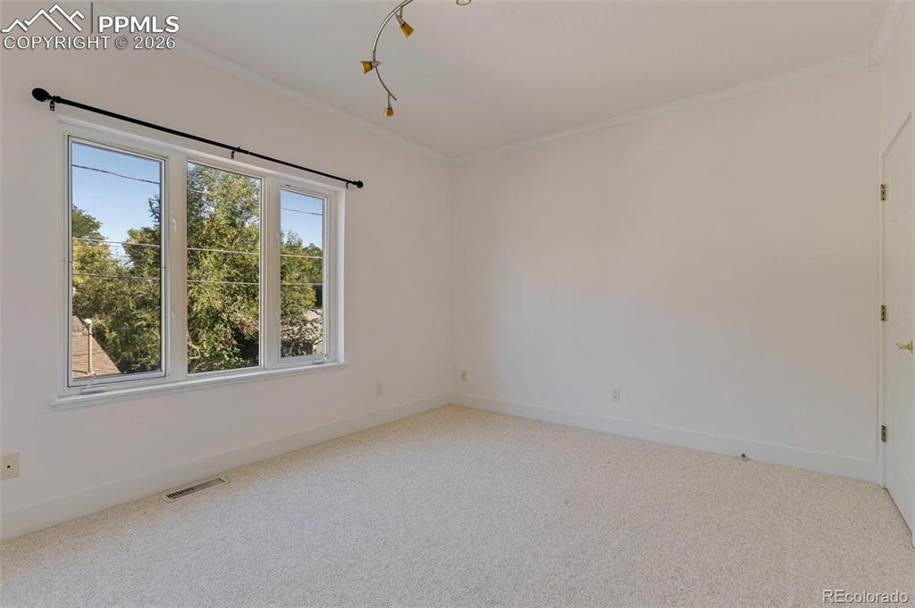 Image 22 of 27: Third Bedroom w/Huge Windows.