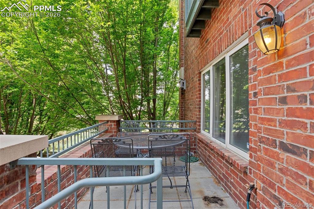 Image 3 of 27: Rad Brick Patio.  Perhaps a Beverage?