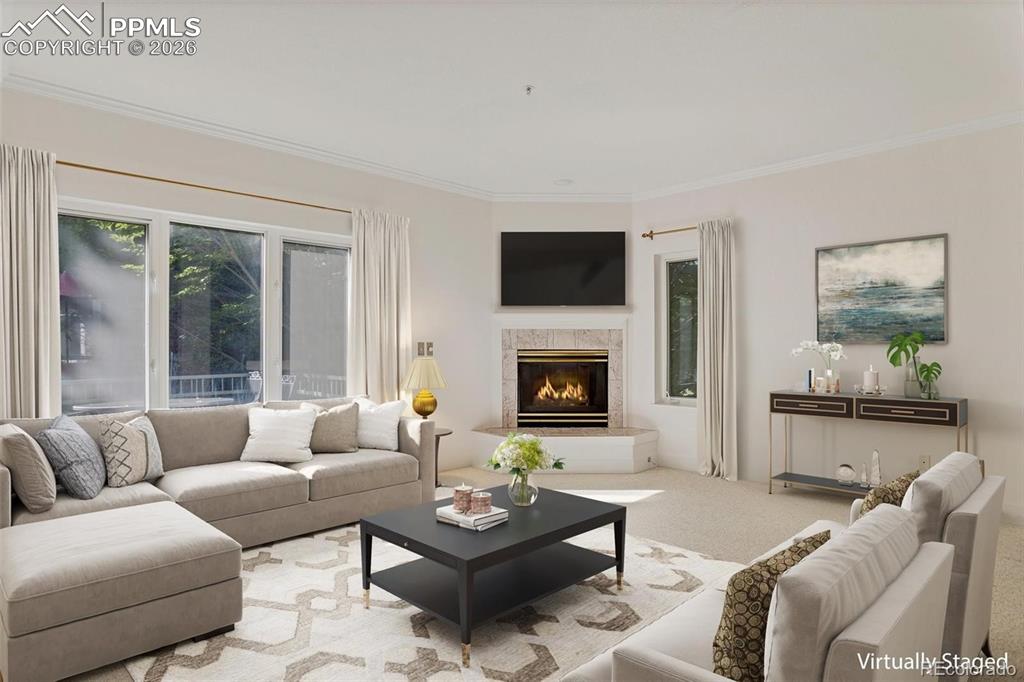 Image 4 of 27: Open Concept Living Room Bathed in Light