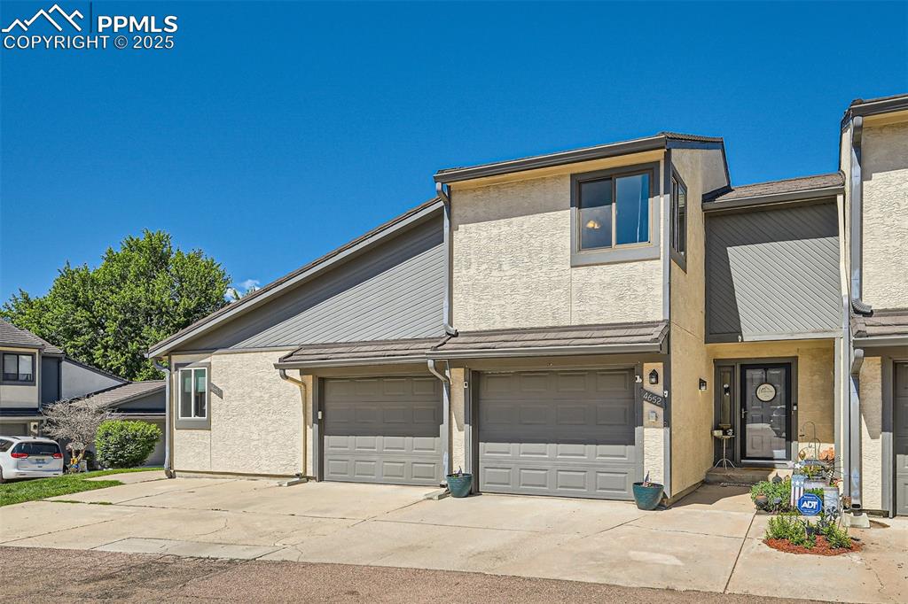 Caption: This beautifully renovated two-story townhome blends modern elegance with everyday comfort