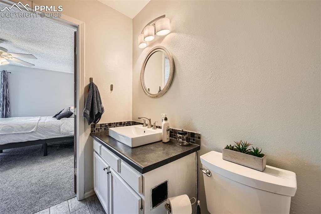 Image 15 of 29: Upper-level full bath