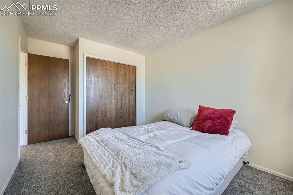 Image 18 of 29: This bedroom has wonderful mountain views