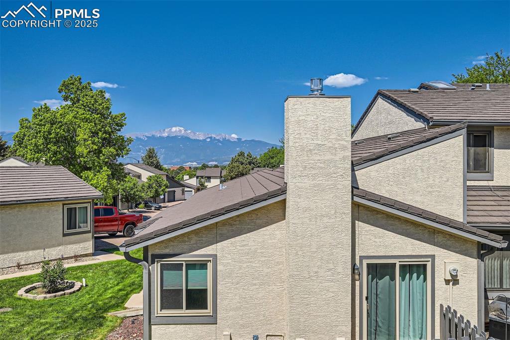 Image 28 of 29: View of Pike Peak from the rear composite deck