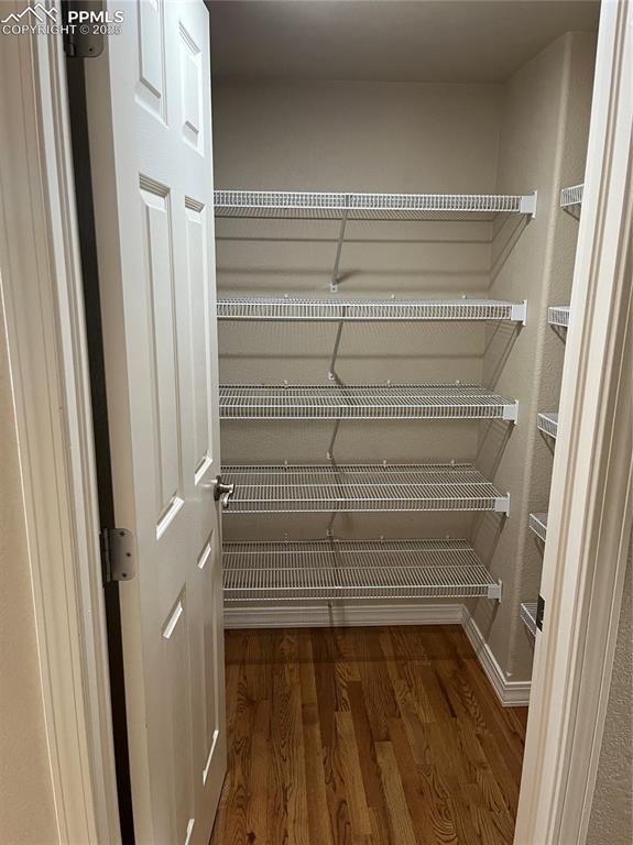 Image 11 of 38: Walk-in Kitchen Pantry