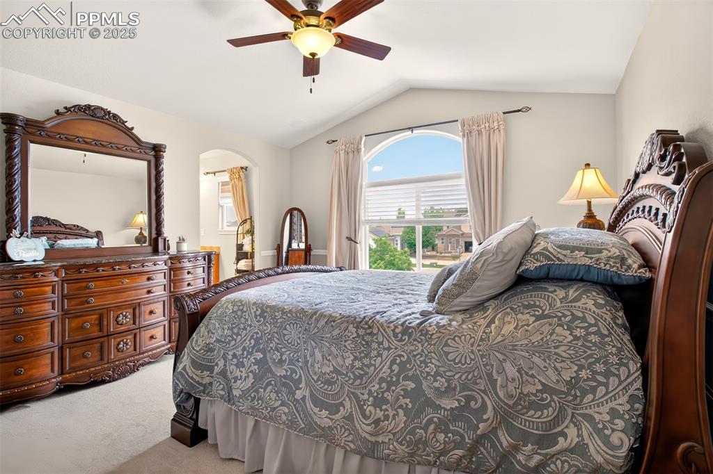 Image 16 of 38: Primary Bedroom with on suit double vanity