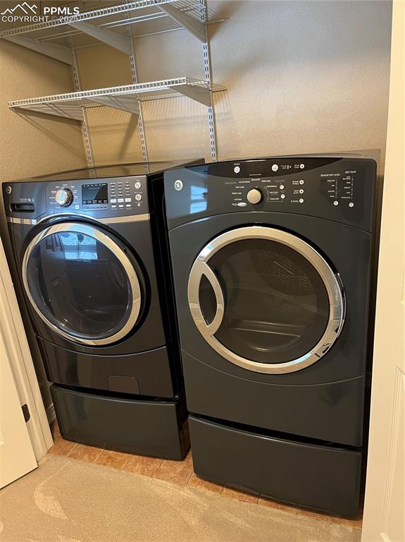 Image 28 of 38: Upper level laundry