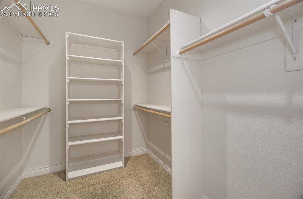 Image 16 of 48: Primary bathrooms walk in closet