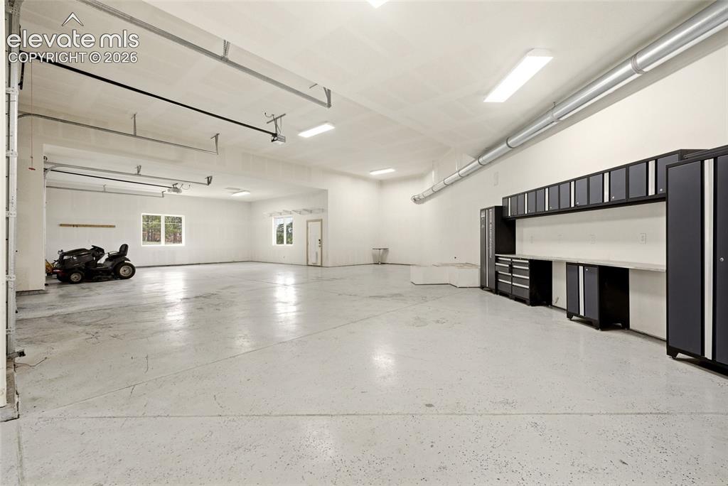 Image 40 of 50: Oversized 6 car garage with RV hookup