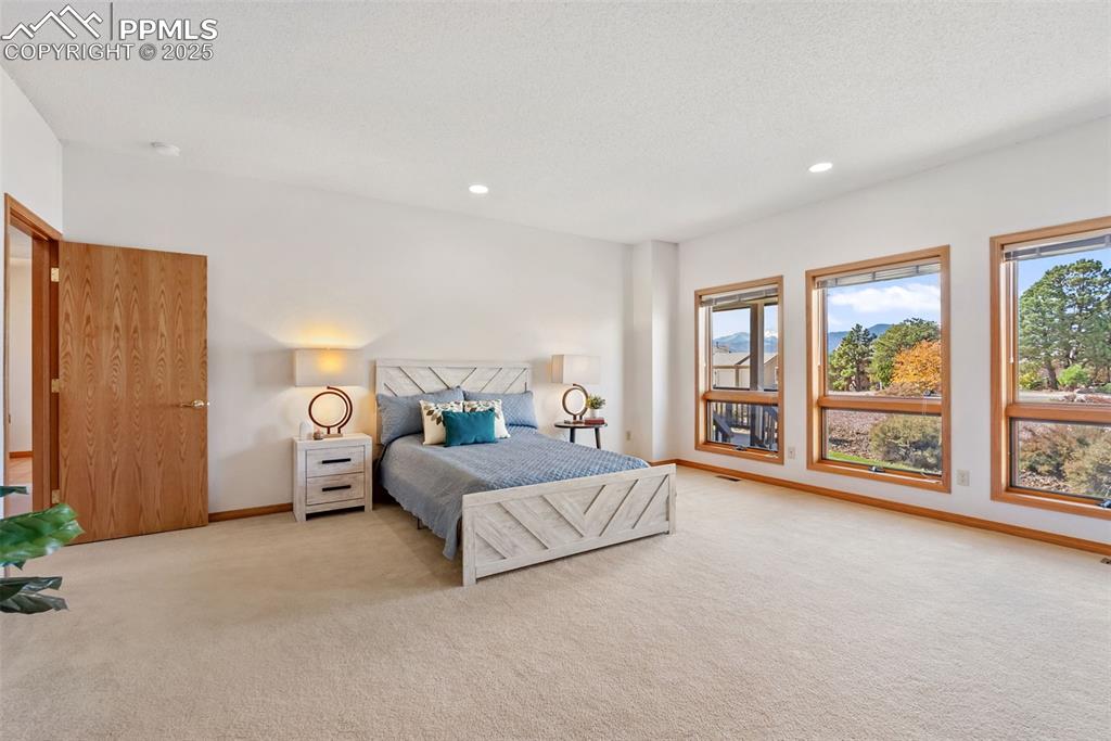 Image 13 of 35: Primary Bedroom w Incredible Views