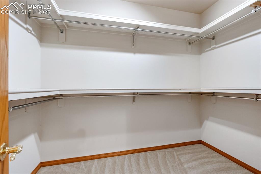 Image 19 of 35: Primary Walk In Closet