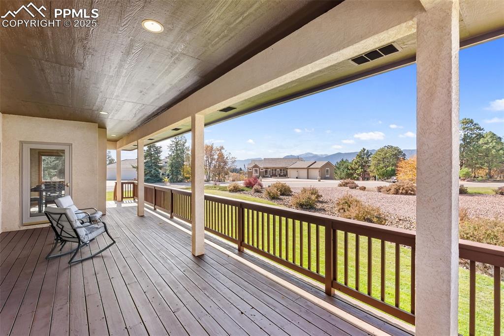 Image 29 of 35: Covered Deck w Amazing Views