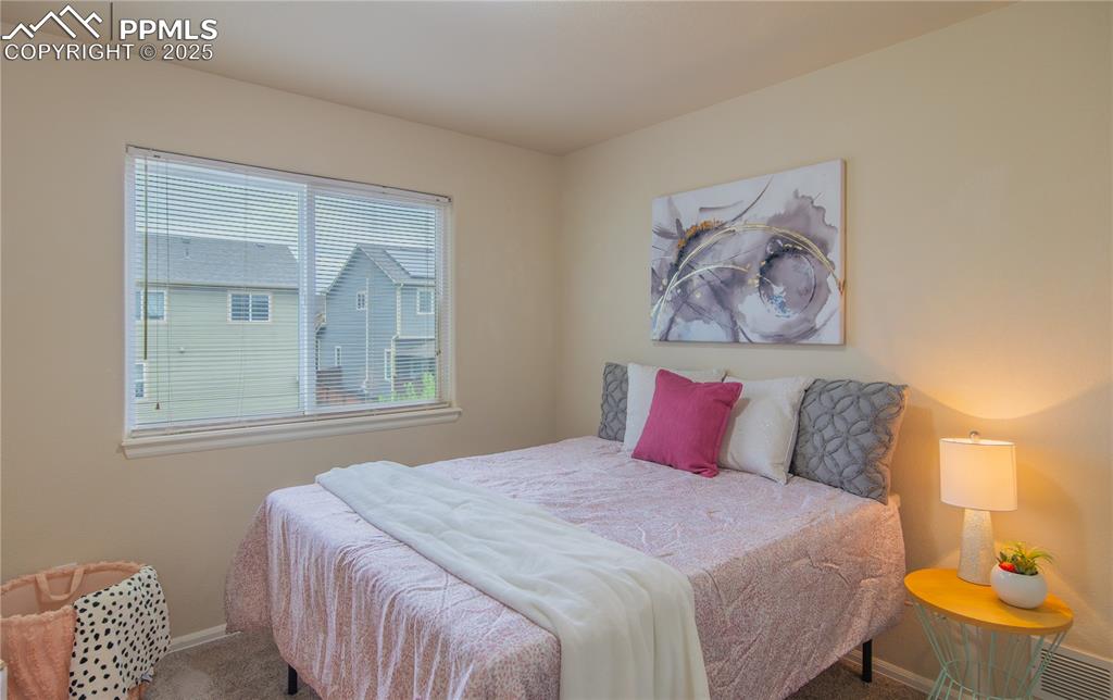 Image 11 of 22: Upper bedroom