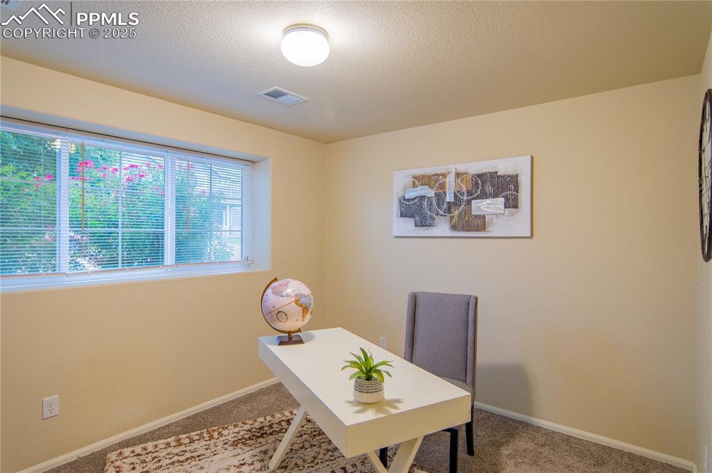 Image 17 of 22: Basement bedroom
