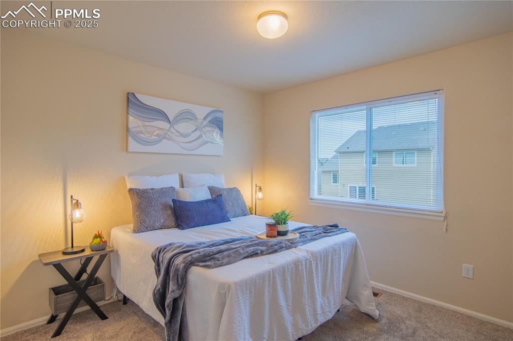 Image 9 of 22: Upper bedroom