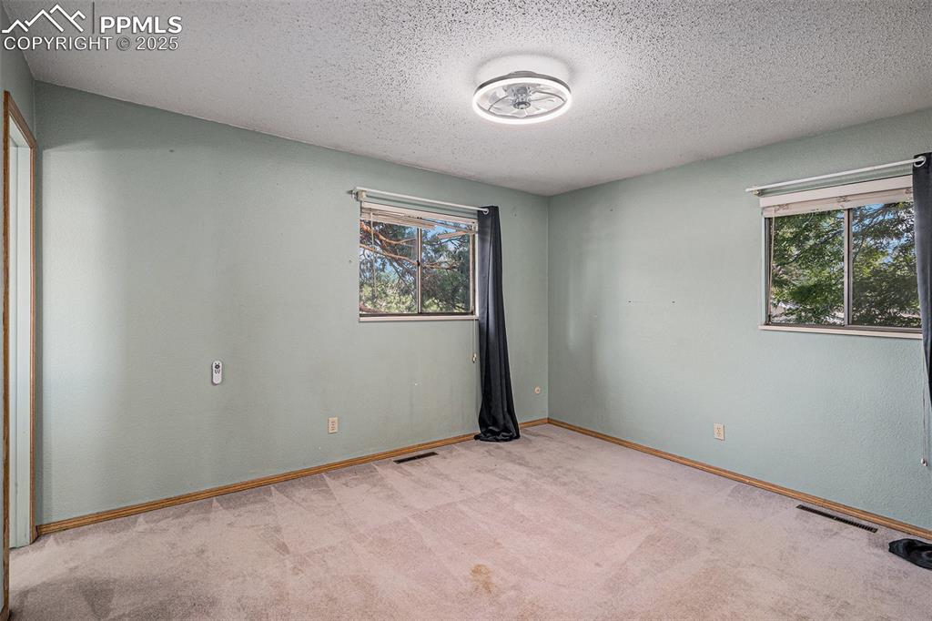 Image 10 of 20: Primary Bedroom with Adjoining Bathroom!