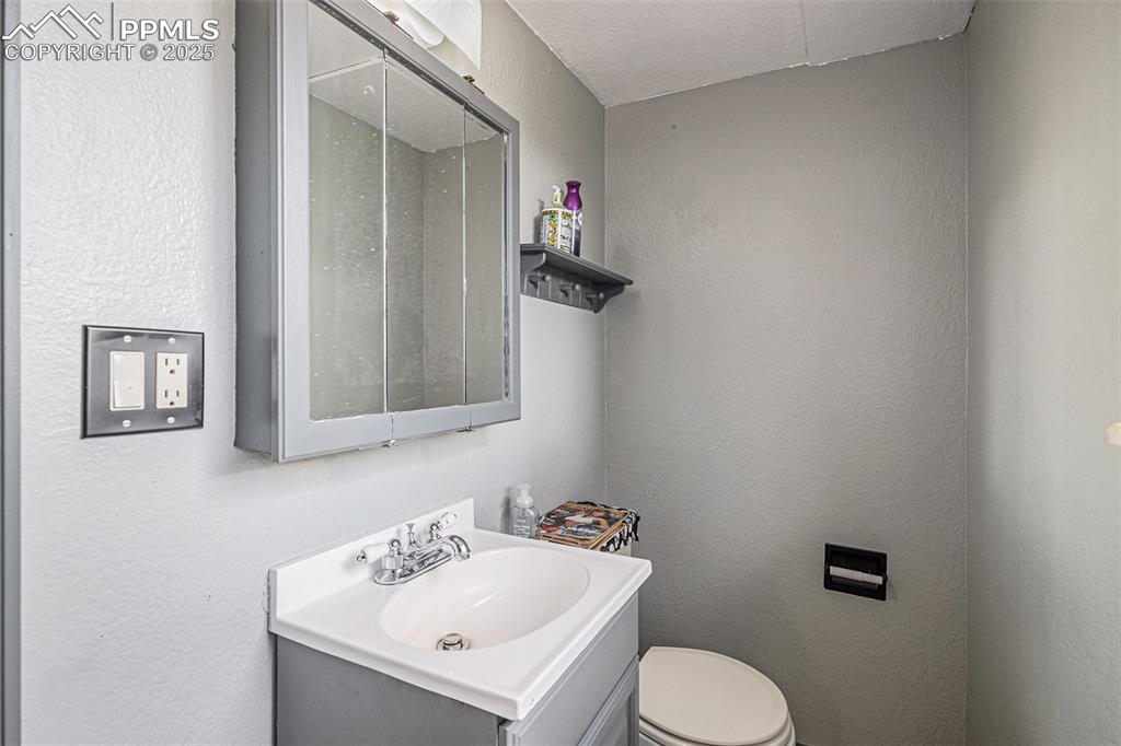 Image 17 of 20: Half Bath on the Lower Level!
