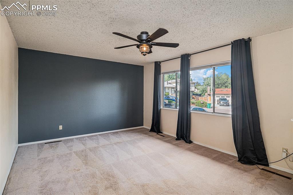 Image 3 of 20: Spacious Living Room on the Main Level