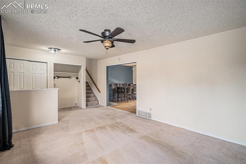 Image 4 of 20: Living Room and Entry with two Closets!