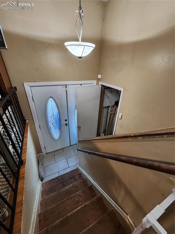 Image 17 of 33: Entrance foyer with garage entry