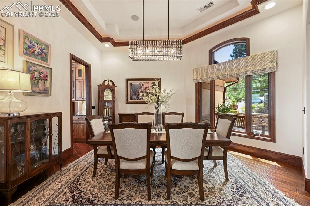 Image 5 of 50: Formal dining room with easy access off the kitchen