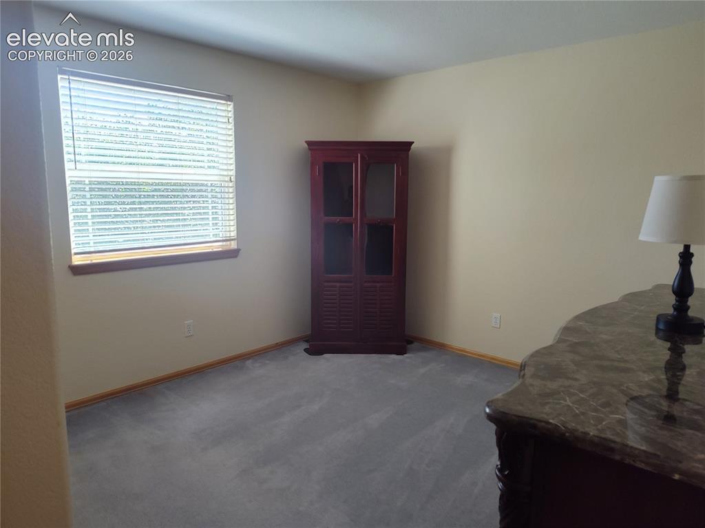 Image 34 of 49: Third bedroom upper level